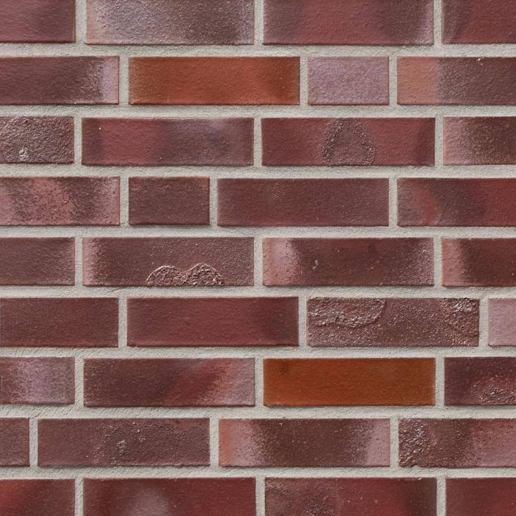 Ziegelsteinmuster in Rot- und Brauntönen.