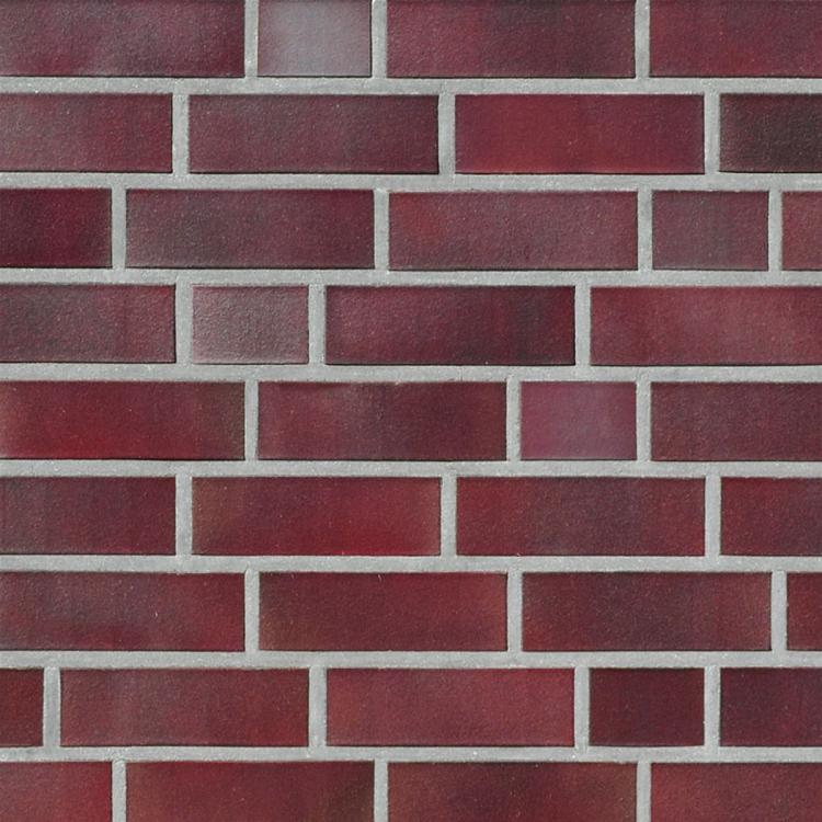 Ziegelmauer aus roten Backsteinen.