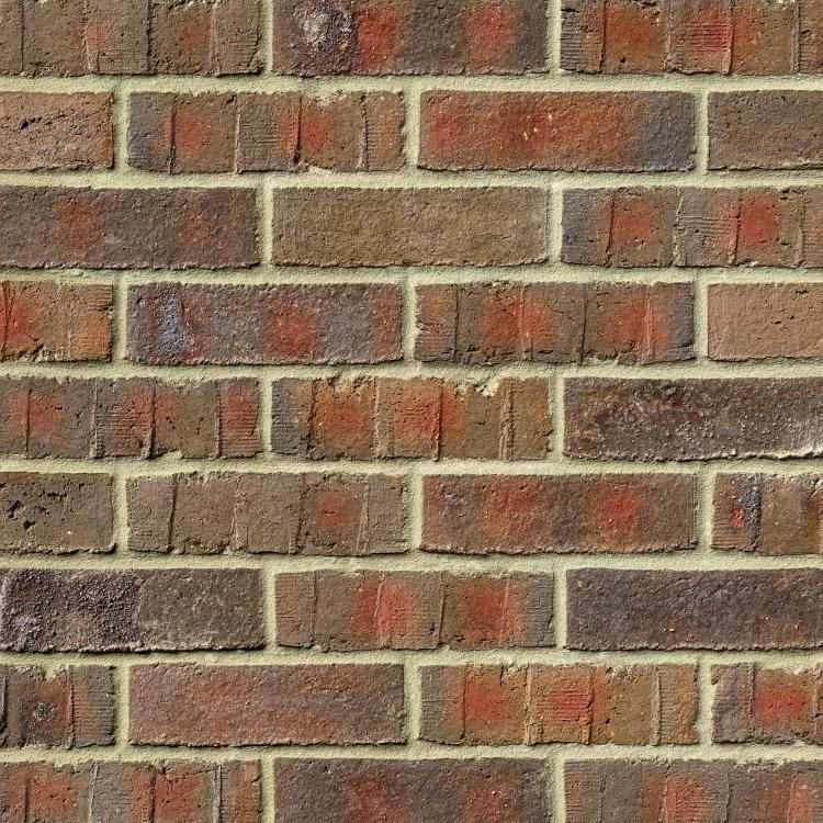 wiesmoor_kohle_bunt_nf_50-50 Backsteinmauer mit roten und braunen Ziegeln.