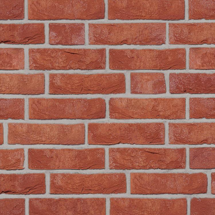 Rote Ziegelsteinmauer mit symmetrischem Muster.