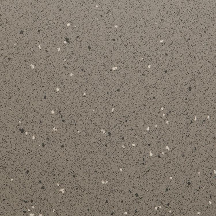 Grauer Steinboden mit schwarzen und weißen Sprenkeln.