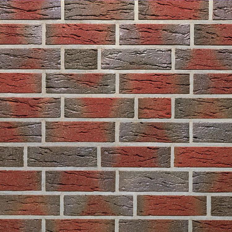 Rotbraune Backsteinmauer mit grauen Fugen, gestapelt in regelmäßigen Reihen.